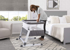 Simmons Kids Room2Grow 2-in-1 Newborn Bedside Bassinet & Infant Sleeper - Height Adjustable Portable Crib